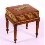 A George IV oak needlepoint stool, circa 1823,