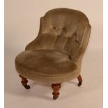 A Victorian low chair, circa 1870, with buttoned back,