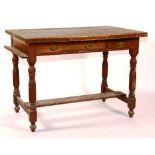 A Victorian oak and pine writing table, with three drawers,