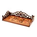 A 19th century parquetry and fretwork book tray, circa 1880, with pierced gallery,