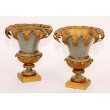A pair of painted tole and giltwood vases circa 1940's, decorated with leaf-cast rims,