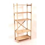A painted etagere, with five shelves,