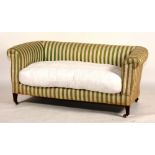 A Chesterfield parlour sofa, in the manner of Howard, circa early 20th century,