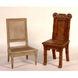 A Louis XVI pitch pine hall chair, 84cm high,