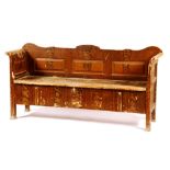 A Romanian painted pine bench, circa late 19th century, with hinged seat,