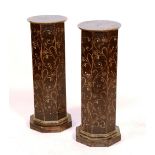 A pair of 19th century ebonised columnar stands, circa 1870, of octagonal form,