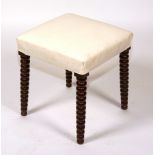 A bobbin legged dressing stool, circa 1840, with later upholstered top,