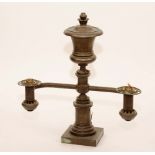 A George IV bronze colza lamp, circa 1825, with two branches,