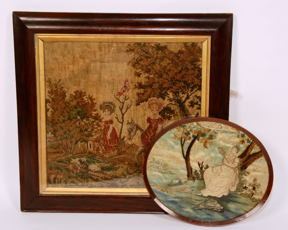 A framed needlework on silk panel, circa 19th century, depicting a lady leaning on tree at river,