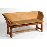 A painted wooden low bench,