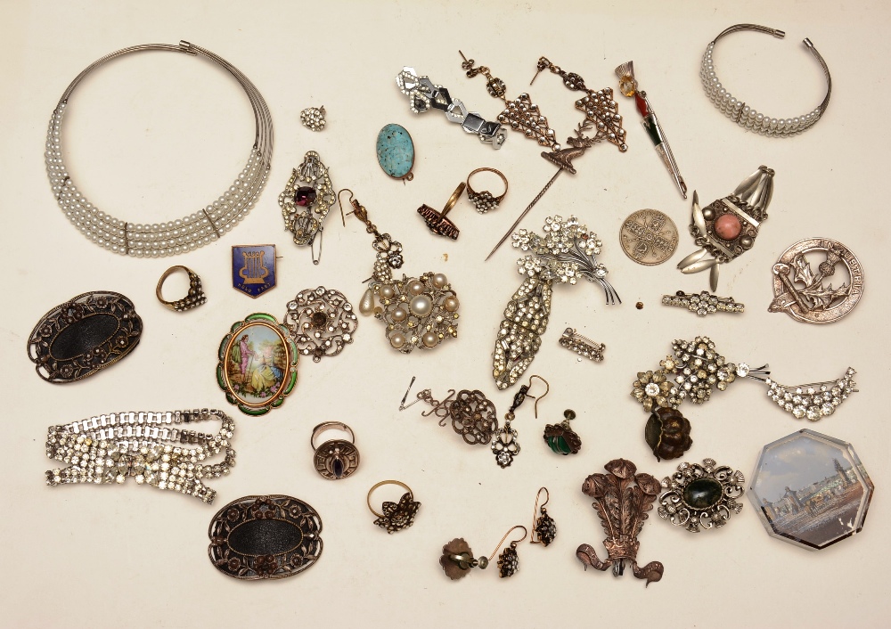 A collection of silver and costume jewellery, including chokers, bracelets, brooches,