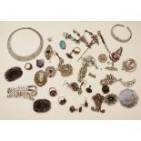 A collection of silver and costume jewellery, including chokers, bracelets, brooches,