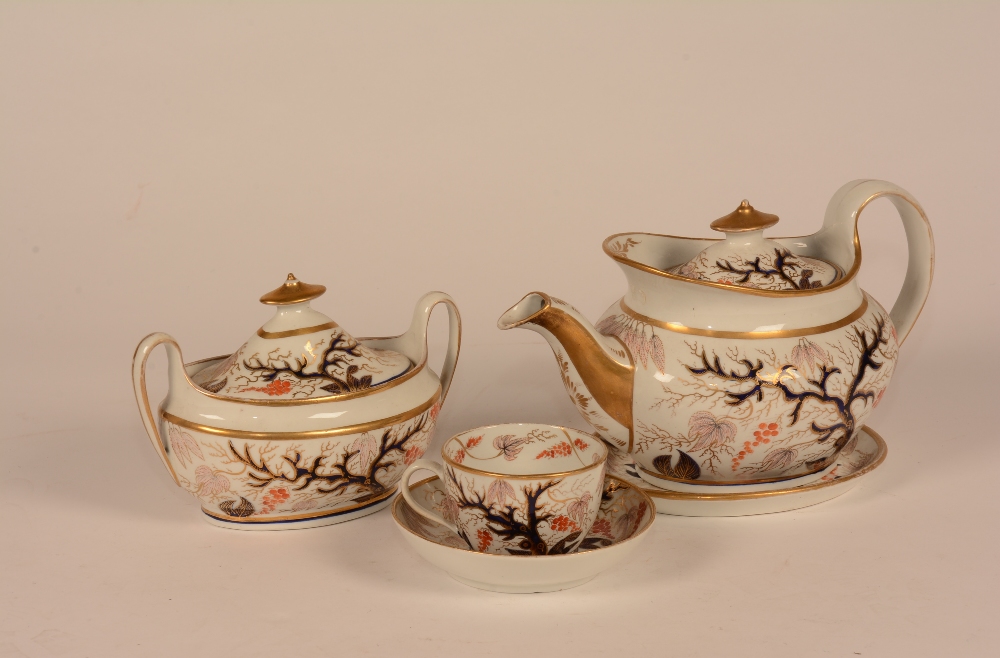 A porcelain teaset, circa late 18th century, decorated with Imari coloured foliate panels,