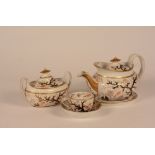 A porcelain teaset, circa late 18th century, decorated with Imari coloured foliate panels,