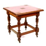 A Scottish Celtic Revival walnut and yewwood table, circa 1880,