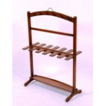 A George III mahogany boot/shoe rack, circa early 19th century, of typical form with pegs to top,