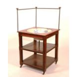 A corner washstand circa 1900, with metal gallery rail,