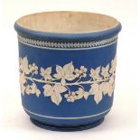 A Wedgwood Jasperware planter, decorated with floral banding,