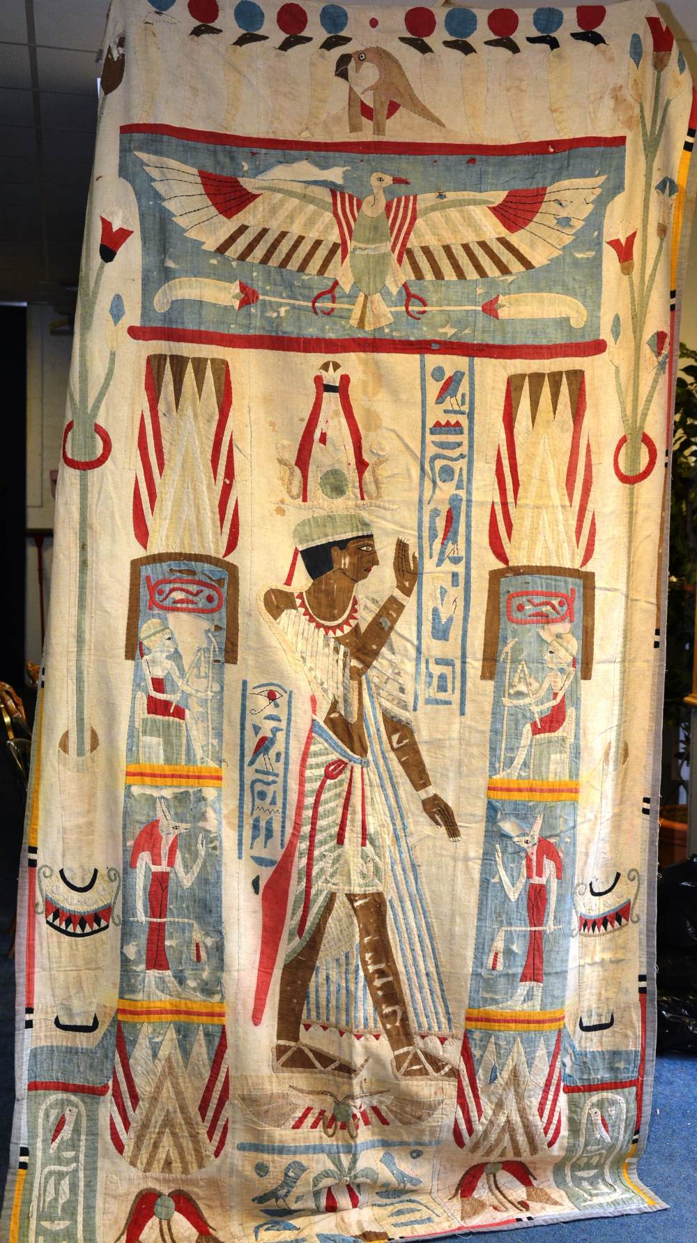 An Egyptian applique wall panel circa 1920, with cotton appliques of pharaonic design,