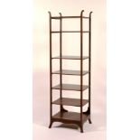 A mahogany shelved etagere, circa 1815, with seven shelves,