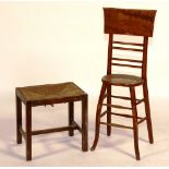 A stained beech child's correction chair, circa 1830, with caned seat, 98cm high x 29cm wide,