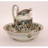 A Corona ware pottery toilet jug with matching basin, jug 33cm high,