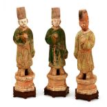 A set of three Chinese Ming pottery immortal figures,