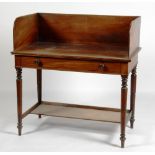 A George IV Mahogany washstand in the manner of Gillow, with high back, frieze drawer,