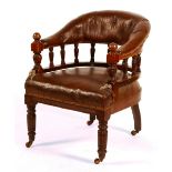 A Victorian walnut desk armchair, circa 1880, with buttoned back and turned frame, seat a/f,