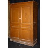 A large French painted pine cupboard, circa 19th century, with two panelled doors, approx.