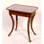 A 19th century Viennese mahogany work table, circa 1825, with hinged damask top,