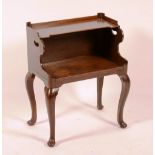 A George III style mahogany bedside table, circa early 19th century, with shelf above open recess,