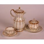 A KPM porcelain tea service, decorated with gilded banding on white ground, comprising of teapot,