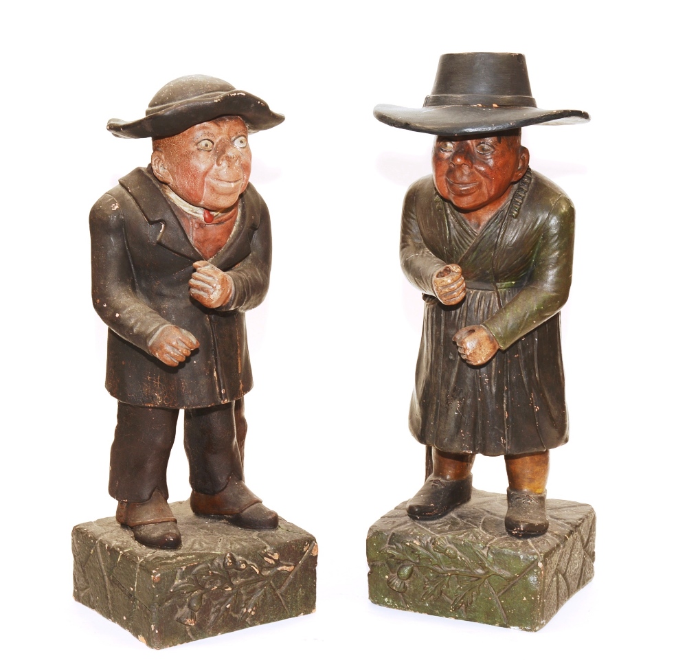 A pair of 19th century painted terracotta caricature figures, circa 1865,