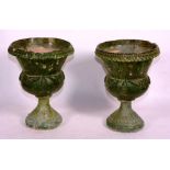 A pair of large French faience jardiniere's, the green ground with raised swagged decoration,