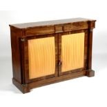 A Victorian rosewood side cabinet, the two doors with lemon coloured silk panels,