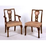 A set of eight walnut dining chairs, in the manner of Edwin Lutyens, circa 1920,