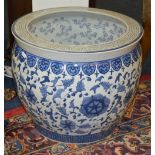A large Chinese blue and white pottery jardiniere/planter,