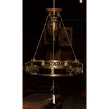 A brass rise and fall ceiling light circa early 20th century, with three light sconces,