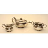 A George IV silver three piece tea service, with hallmarks for Edinburgh 1829,