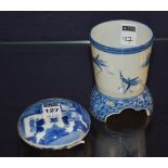 A Chinese blue and white pottery jar with cover, decorated with figure on white ground,