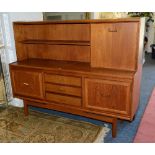 A retro teak sideboard by William Lawrence Nottingham, with shelved upstand above three drawers,