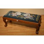 A stained wood and needlepoint stool, the top depicting birds,