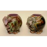 A pair of Alloa majolica pottery vases, with shell relief decoration on purple, green,