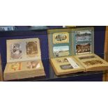 Three vintage postcard albums circa early 20th century,