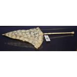 A Victorian lace parasol with ivory handle,
