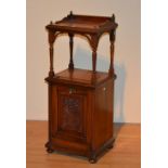 A late Victorian mahogany perdonium, with gallery top above open recess,