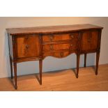 A reproduction sideboard,