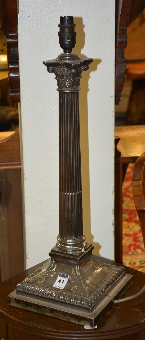 A plated Corinthian style table lamp, with fluted column raised on embossed square base,