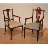 Two Edwardian mahogany open armchairs, both with pierced splat backs,